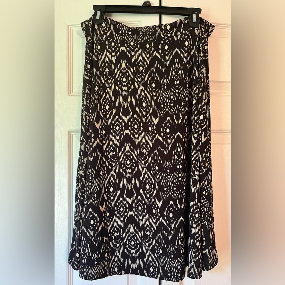 LuLaroe Azure skirt in a silky black & tan material.  Size large